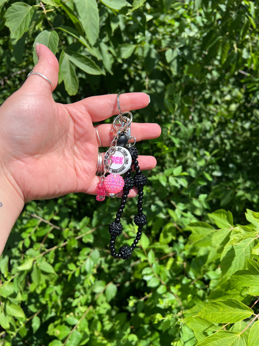 Pink and black f*ck key chain